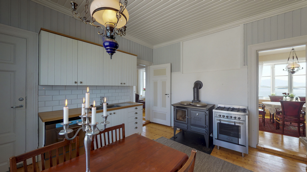 Cosy kitchen inside the lighthouse keeper’s house on a private island in Norway.